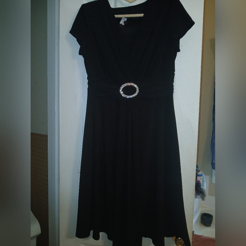 Elegant Black Dress with Embellished Waist
